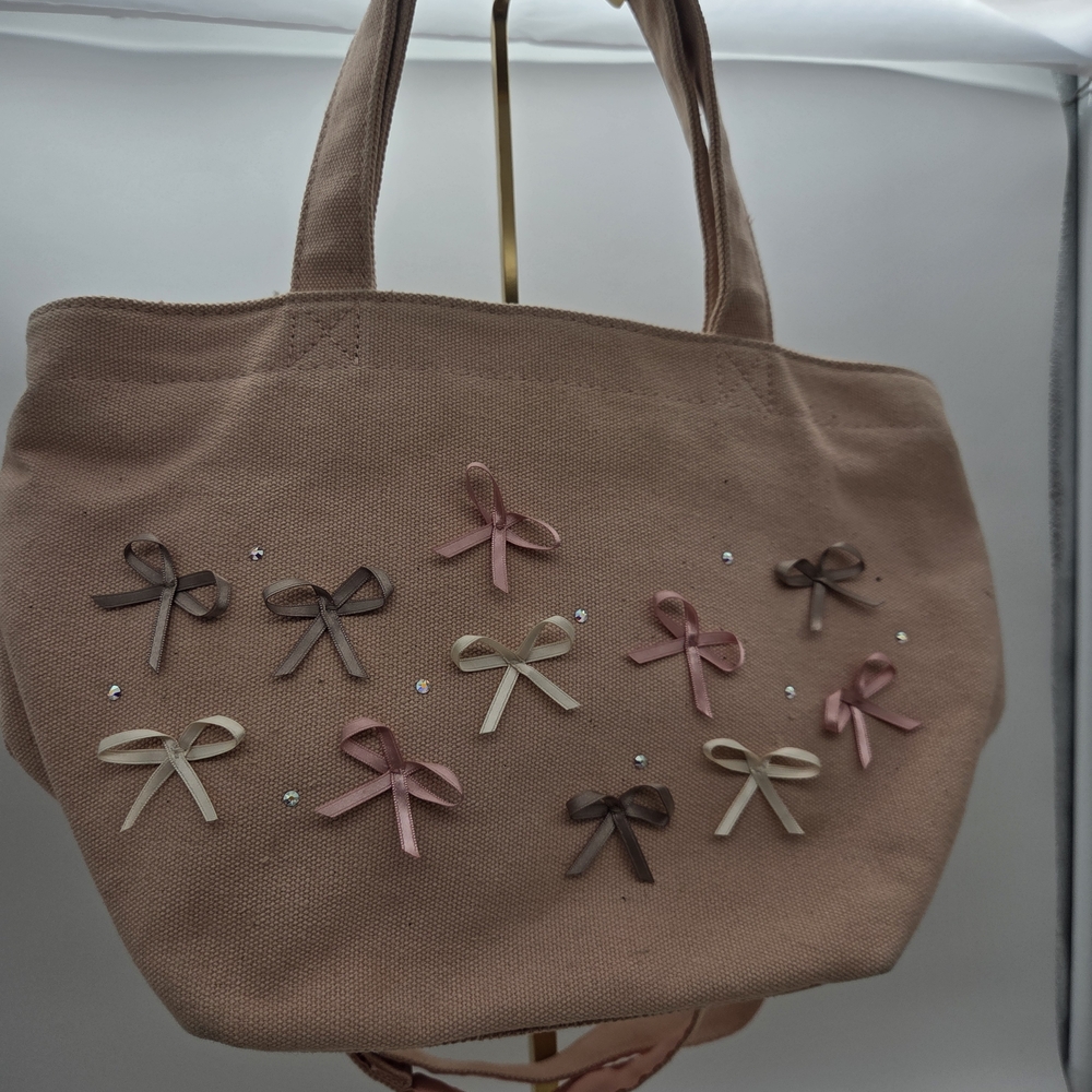 Tocca Bow-Embellished Pink Crossbody Handbag